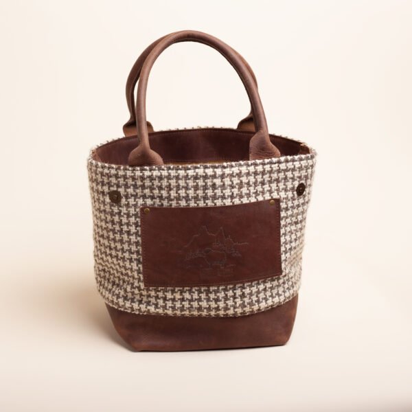 handwoven brown and white houndstooth tote with leather accents