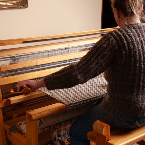 jess weaving at a floor loom
